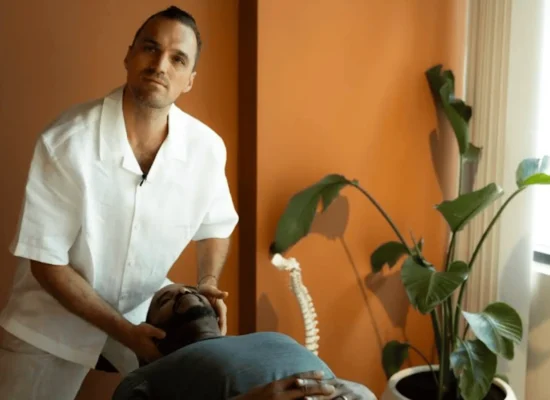 Dominik of Spine Line Chiropractic is working on Sam of Oman360Views